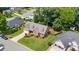 Aerial view of this home in a beautiful neighborhood and a well-manicured lawn and landscaping at 412 Whitt Ave, Burlington, NC 27215