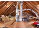 Exposed beams, ductwork, and an HVAC system in the attic at 412 Whitt Ave, Burlington, NC 27215