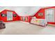 Attic bedroom with dormers, carpet and a quaint quilt on the bed at 412 Whitt Ave, Burlington, NC 27215