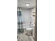 Bathroom with toilet, bathtub, and single sink vanity at 426 Smith St, Burlington, NC 27217