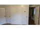 Bedroom with hardwood flooring and view of a hallway at 426 Smith St, Burlington, NC 27217