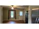 An interior living space featuring a decorative fireplace, neutral wall color, and hardwood flooring at 426 Smith St, Burlington, NC 27217