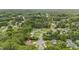 Community aerial showcasing the home's proximity to lush greenery and winding residential streets at 427 Elm Ct, Burlington, NC 27217