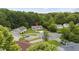 Neighborhood aerial view showing the home's location in a quiet cul-de-sac surrounded by mature trees at 427 Elm Ct, Burlington, NC 27217