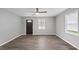 Spacious living area with modern flooring, neutral color palette, and plenty of natural light at 427 Elm Ct, Burlington, NC 27217