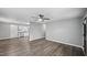 Open-concept living room with modern flooring, neutral walls, and ample natural light at 427 Elm Ct, Burlington, NC 27217