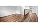This empty room features wood floors, white walls and a closet at 4703 Pleasant Green Rd, Durham, NC 27705