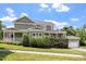Well-maintained home with a lush green lawn, an attached garage, and inviting covered porch at 500 Weaver Mine Trl, Chapel Hill, NC 27517
