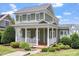 Attractive two-story home with a covered front porch, lush greenery, and a well-kept yard at 500 Weaver Mine Trl, Chapel Hill, NC 27517