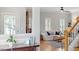 Bright living space showcasing hardwood floors and stairs at 500 Weaver Mine Trl, Chapel Hill, NC 27517