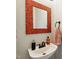 Cozy bathroom showcasing a vibrant mirror and modern fixtures at 5405 Doemont Dr, Apex, NC 27539