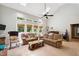 Spacious living room featuring high ceilings, skylights, and views of the outdoors at 5405 Doemont Dr, Apex, NC 27539