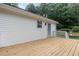 Back deck perfect for entertaining with views of the spacious backyard and mature trees at 5428 Passenger Pl, Raleigh, NC 27603