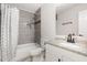 Bathroom with updated vanity and fixtures, granite countertops and shower-tub combo at 5428 Passenger Pl, Raleigh, NC 27603