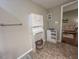 Bathroom with storage cabinet and a view to the living room at 5500 Fortunes Ridge Dr # 94C, Durham, NC 27713