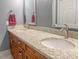 Close-up of granite countertops and double sinks in the updated bathroom at 5500 Fortunes Ridge Dr # 94C, Durham, NC 27713