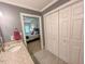Bathroom featuring a white sink and granite counters, with closet access at 5500 Fortunes Ridge Dr # 94C, Durham, NC 27713
