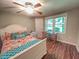 Serene bedroom with a ceiling fan, a desk, and natural light from a window at 5500 Fortunes Ridge Dr # 94C, Durham, NC 27713