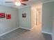 Bedroom with neutral walls and carpet and a ceiling fan with light at 5500 Fortunes Ridge Dr # 94C, Durham, NC 27713