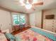 Bright bedroom featuring a desk and natural light from a window at 5500 Fortunes Ridge Dr # 94C, Durham, NC 27713