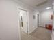 Bedroom featuring neutral carpeting and a doorway view of the bathroom at 5500 Fortunes Ridge Dr # 94C, Durham, NC 27713