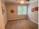 Bedroom with neutral walls and carpet and a ceiling fan with light at 5500 Fortunes Ridge Dr # 94C, Durham, NC 27713