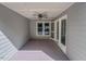 Covered porch featuring a ceiling fan, and ample light with access to the home at 5500 Fortunes Ridge Dr # 94C, Durham, NC 27713