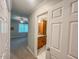 Hallway view into the primary bedroom and bathroom at 5500 Fortunes Ridge Dr # 94C, Durham, NC 27713