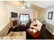 Well-lit living room featuring hardwood floors, a fireplace, comfortable seating, and an open layout at 5500 Fortunes Ridge Dr # 94C, Durham, NC 27713