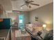 Comfortable living room featuring hardwood floors, plush seating, and a ceiling fan at 5500 Fortunes Ridge Dr # 94C, Durham, NC 27713