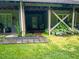 Charming lower-level patio, surrounded by lush greenery, provides a private outdoor space at 5500 Fortunes Ridge Dr # 94C, Durham, NC 27713
