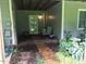 Quaint, covered patio area that is perfect for enjoying the outdoors, and peaceful relaxation at 5500 Fortunes Ridge Dr # 94C, Durham, NC 27713