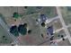 Aerial view shows large lot and location. The property features an outdoor kitchen and garden at 56 Sugarhill Dr, Zebulon, NC 27597