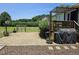 Paver patio with an overhead pergola is ideal for outdoor grilling, relaxation and entertaining at 56 Sugarhill Dr, Zebulon, NC 27597