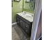 Charming bathroom vanity with double sinks, ample storage, and modern fixtures at 56 Sugarhill Dr, Zebulon, NC 27597