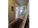 Hallway view showing access to both a bathroom and bedroom at 56 Sugarhill Dr, Zebulon, NC 27597