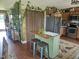 View of kitchen with island, seating, stainless appliances, and wood cabinets at 56 Sugarhill Dr, Zebulon, NC 27597