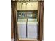 Functional laundry area featuring a washer, dryer, and overhead storage, neatly organized and easily accessible at 56 Sugarhill Dr, Zebulon, NC 27597