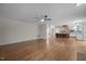 Living room opening into kitchen with large island and stainless appliances at 6001 Waters Way Dr, Raleigh, NC 27606