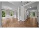 Open-concept floorplan with a view of the staircase and access to other rooms at 6001 Waters Way Dr, Raleigh, NC 27606