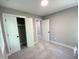 Bedroom featuring neutral walls, carpet, and a sliding closet door at 608 A E Umstead, Durham, NC 27701