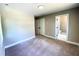 Spacious bedroom with plush carpeting and ensuite bathroom and closet at 608 A E Umstead, Durham, NC 27701