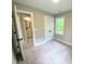 Bedroom with an ensuite bathroom featuring modern accents and neutral color palette at 608 A E Umstead, Durham, NC 27701
