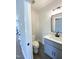 Stylish powder room featuring shiplap accent wall, modern vanity, and sleek fixtures at 608 A E Umstead, Durham, NC 27701