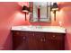 Charming powder room featuring elegant mirror, lighting fixtures, and vanity at 618 N Boylan Ave # 520, Raleigh, NC 27603