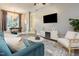 Cozy living room with modern decor, stylish furniture, and a large window at 618 N Boylan Ave # 520, Raleigh, NC 27603