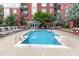 Community pool with lounge chairs; a refreshing and relaxing amenity for residents and guests at 618 N Boylan Ave # 520, Raleigh, NC 27603