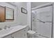 Elegant bathroom featuring a modern vanity, updated fixtures, and a glass-enclosed shower at 6701 Winding Trail Trl, Raleigh, NC 27612