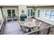 Spacious wooden deck with patio furniture and grill perfect for outdoor entertaining at 7016 Valley Dr, Raleigh, NC 27612