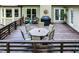 Spacious outdoor deck area, perfect for dining and relaxing, overlooking the backyard at 7016 Valley Dr, Raleigh, NC 27612